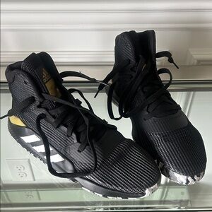 Adidas Black and Gold Athletic Sneakers